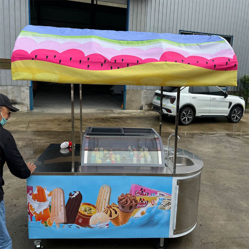 Ice Cream Push Cart featuring a colorful canopy and a display of ice cream treats, perfect for outdoor events.